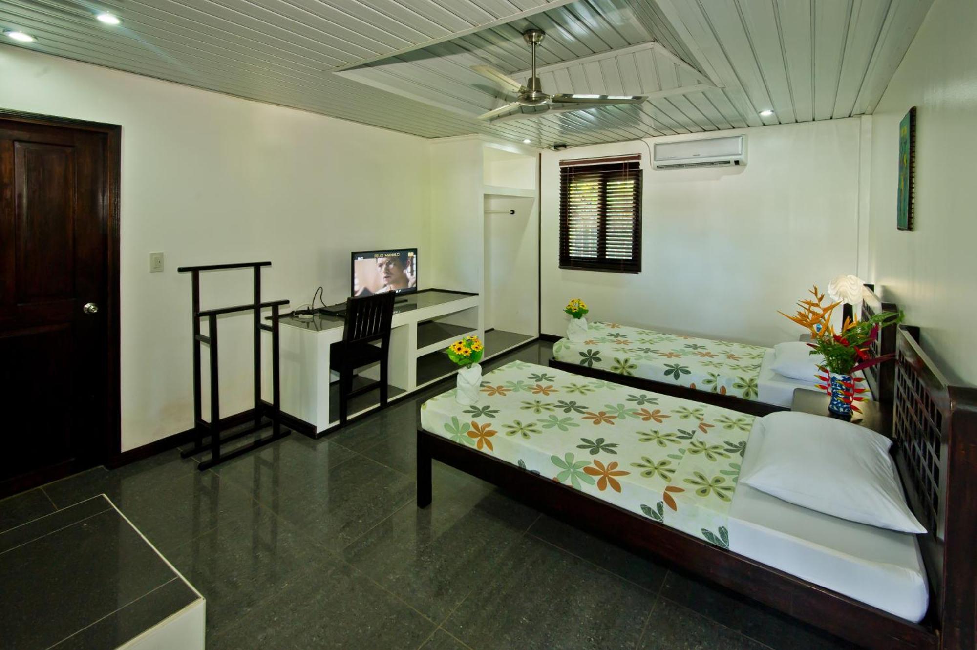 Balay Tuko Garden Inn Пуэрто-Принцеса Номер фото
